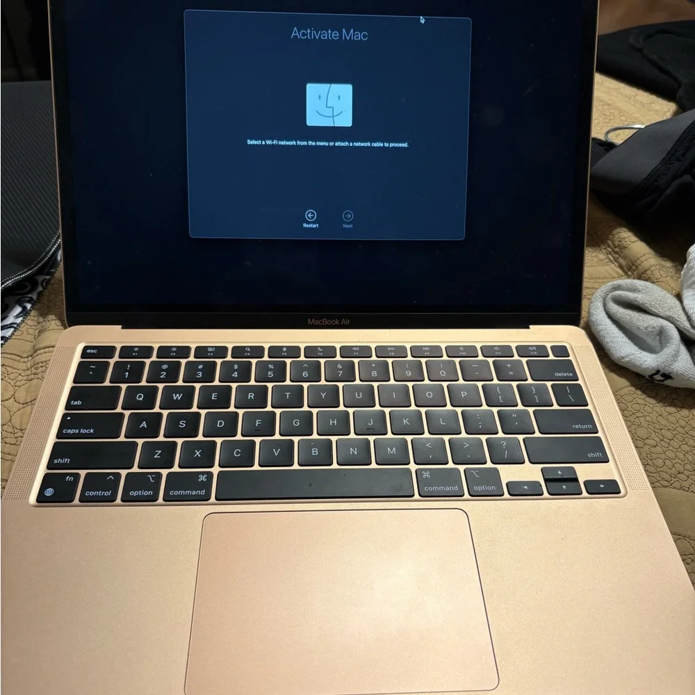 Apple MacBook in Gold with Unique Stickers